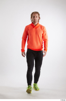   Erling  1 black pants dressed front view orange long sleeve t shirt sports walking whole body yellow sneakers 0001.jpg
